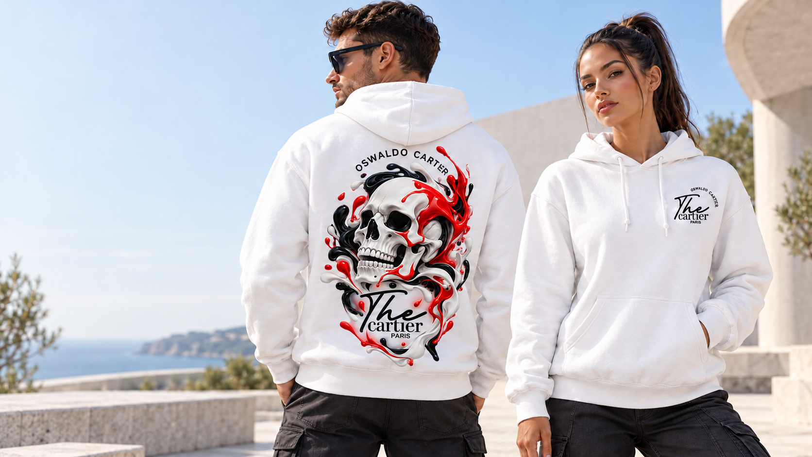 Hoodies Crâne Oswaldo Cartier portés sur une terrasse face à la mer